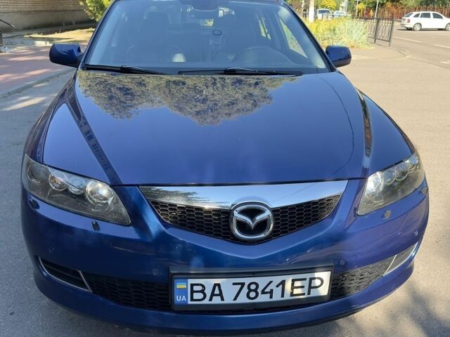 Синий Мазда 6, объемом двигателя 2.26 л и пробегом 325 тыс. км за 3950 $, фото 1 на Automoto.ua