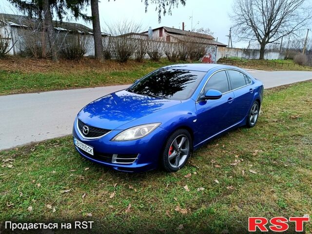 Синий Мазда 6, объемом двигателя 2 л и пробегом 325 тыс. км за 6350 $, фото 1 на Automoto.ua