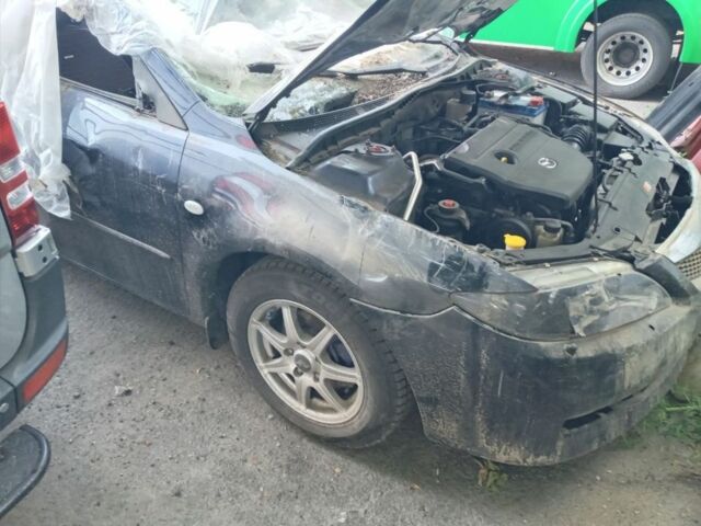Синий Мазда 6, объемом двигателя 1.8 л и пробегом 230 тыс. км за 2000 $, фото 1 на Automoto.ua