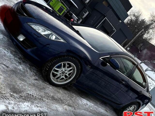 Синий Мазда 6, объемом двигателя 2 л и пробегом 208 тыс. км за 7500 $, фото 1 на Automoto.ua