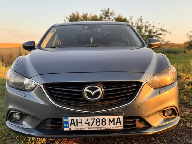 Синий Мазда 6, объемом двигателя 2 л и пробегом 170 тыс. км за 9500 $, фото 1 на Automoto.ua
