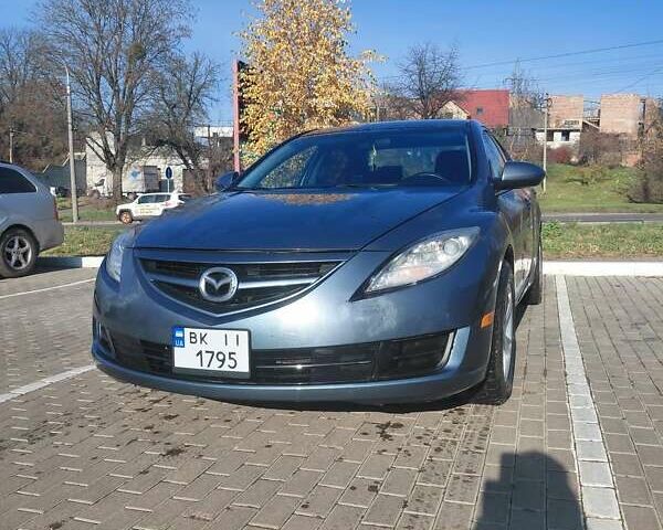 Синий Мазда 6, объемом двигателя 2.49 л и пробегом 257 тыс. км за 7000 $, фото 1 на Automoto.ua