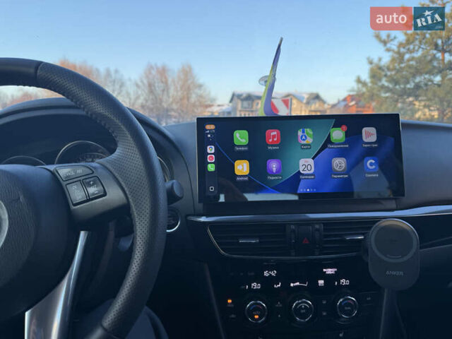 Синий Мазда 6, объемом двигателя 2 л и пробегом 175 тыс. км за 12600 $, фото 1 на Automoto.ua