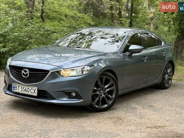 Синий Мазда 6, объемом двигателя 2.49 л и пробегом 218 тыс. км за 10500 $, фото 1 на Automoto.ua