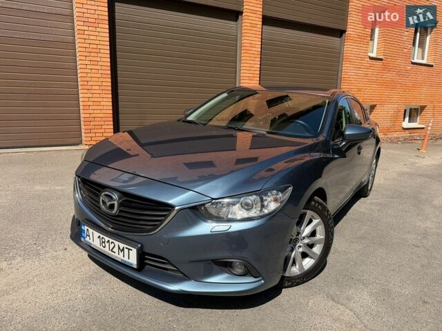 Синій Мазда 6, об'ємом двигуна 2 л та пробігом 215 тис. км за 11399 $, фото 1 на Automoto.ua