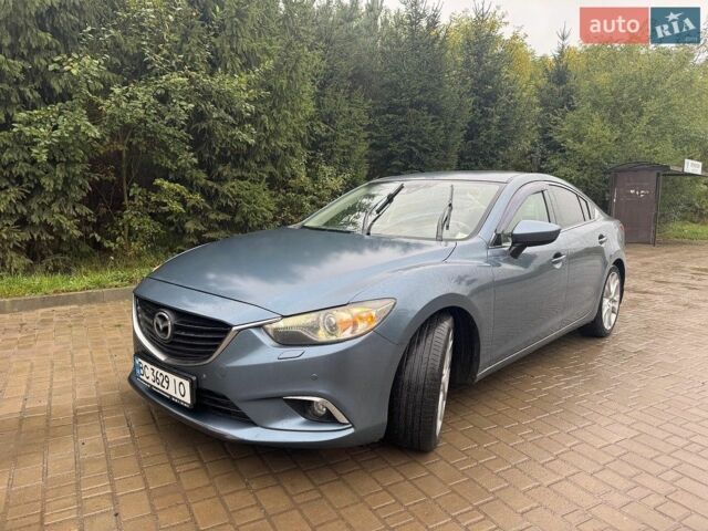 Синий Мазда 6, объемом двигателя 2.19 л и пробегом 255 тыс. км за 9000 $, фото 1 на Automoto.ua