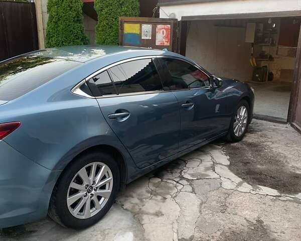 Синий Мазда 6, объемом двигателя 2.49 л и пробегом 202 тыс. км за 12000 $, фото 1 на Automoto.ua