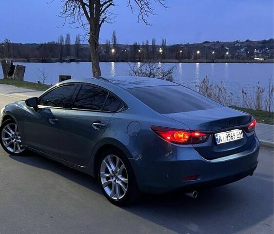 Синий Мазда 6, объемом двигателя 2.5 л и пробегом 133 тыс. км за 11500 $, фото 1 на Automoto.ua