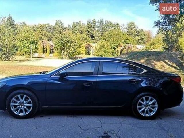 Синий Мазда 6, объемом двигателя 2 л и пробегом 165 тыс. км за 12000 $, фото 1 на Automoto.ua
