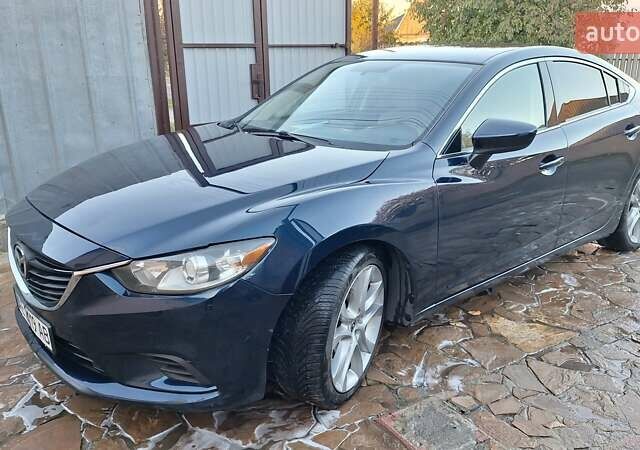 Синий Мазда 6, объемом двигателя 2.49 л и пробегом 205 тыс. км за 13000 $, фото 1 на Automoto.ua