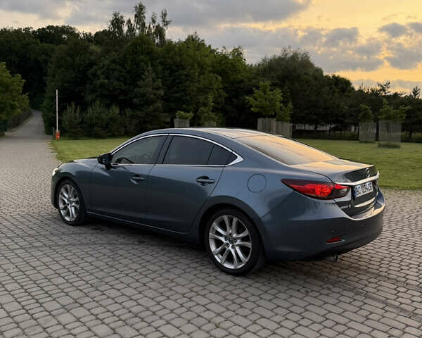 Синий Мазда 6, объемом двигателя 2.49 л и пробегом 176 тыс. км за 13000 $, фото 1 на Automoto.ua