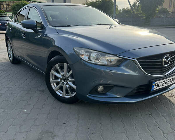 Синий Мазда 6, объемом двигателя 2 л и пробегом 170 тыс. км за 12800 $, фото 1 на Automoto.ua