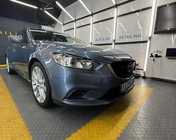 Синий Мазда 6, объемом двигателя 2.49 л и пробегом 74 тыс. км за 13000 $, фото 1 на Automoto.ua