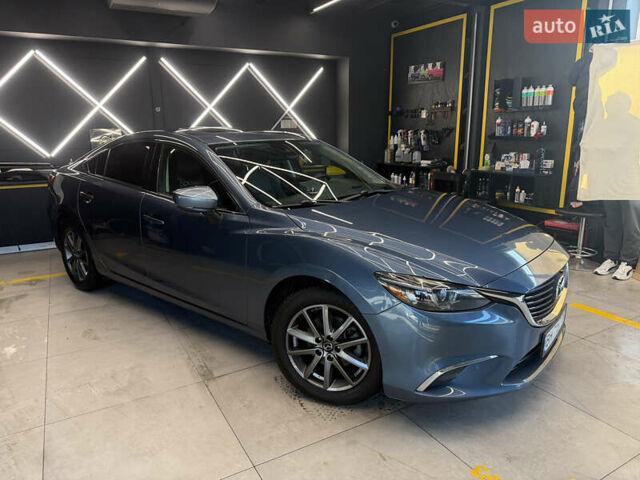 Синій Мазда 6, об'ємом двигуна 2.49 л та пробігом 142 тис. км за 14500 $, фото 1 на Automoto.ua