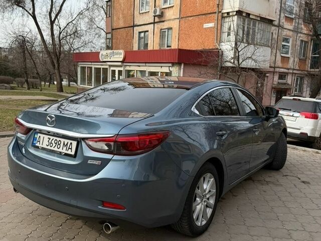 Синій Мазда 6, об'ємом двигуна 2.19 л та пробігом 138 тис. км за 12800 $, фото 1 на Automoto.ua
