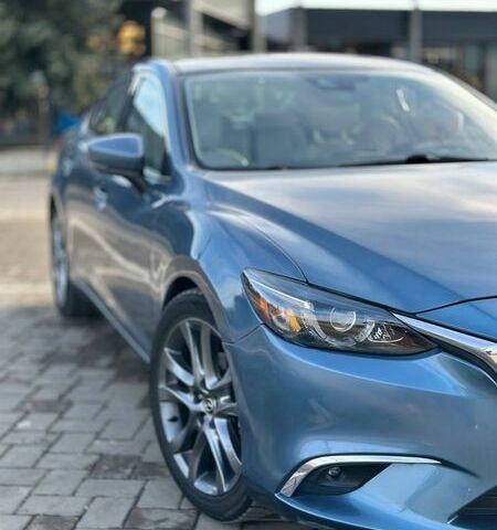 Синій Мазда 6, об'ємом двигуна 2.49 л та пробігом 100 тис. км за 14000 $, фото 1 на Automoto.ua