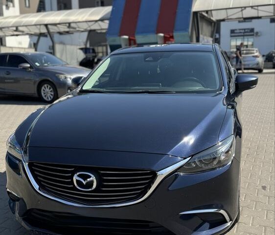 Синий Мазда 6, объемом двигателя 2.5 л и пробегом 200 тыс. км за 12200 $, фото 1 на Automoto.ua