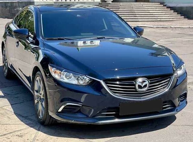 Синий Мазда 6, объемом двигателя 2.5 л и пробегом 95 тыс. км за 12500 $, фото 1 на Automoto.ua