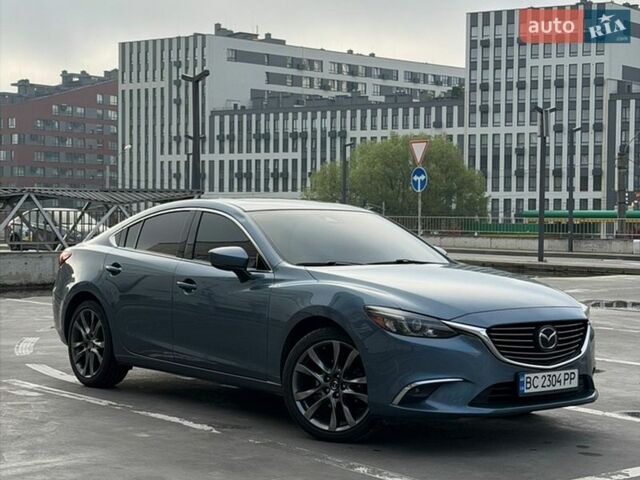Синий Мазда 6, объемом двигателя 2.49 л и пробегом 180 тыс. км за 16000 $, фото 1 на Automoto.ua