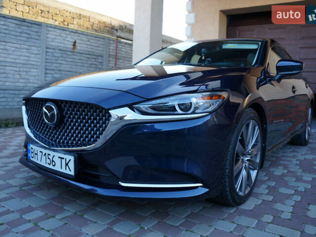 Синий Мазда 6, объемом двигателя 2.49 л и пробегом 98 тыс. км за 19000 $, фото 1 на Automoto.ua