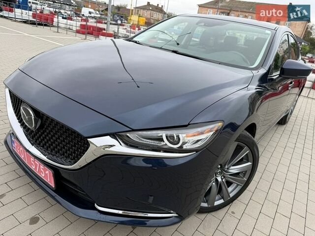 Синий Мазда 6, объемом двигателя 2.5 л и пробегом 135 тыс. км за 16700 $, фото 1 на Automoto.ua