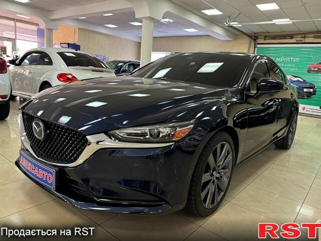 Синий Мазда 6, объемом двигателя 2.5 л и пробегом 131 тыс. км за 17400 $, фото 1 на Automoto.ua