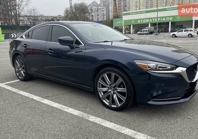 Синий Мазда 6, объемом двигателя 2.49 л и пробегом 132 тыс. км за 18000 $, фото 1 на Automoto.ua