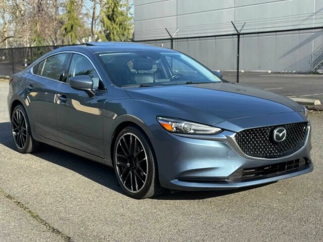 Синий Мазда 6, объемом двигателя 2.5 л и пробегом 33 тыс. км за 6000 $, фото 1 на Automoto.ua