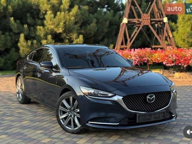 Синий Мазда 6, объемом двигателя 2.49 л и пробегом 96 тыс. км за 16000 $, фото 1 на Automoto.ua