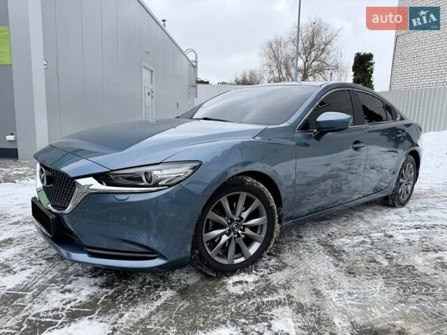 Синий Мазда 6, объемом двигателя 2 л и пробегом 67 тыс. км за 18700 $, фото 1 на Automoto.ua