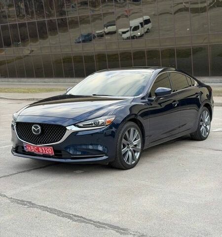 Синий Мазда 6, объемом двигателя 2.5 л и пробегом 106 тыс. км за 16800 $, фото 1 на Automoto.ua