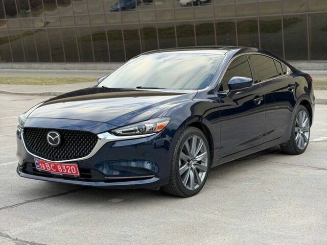 Синий Мазда 6, объемом двигателя 2.5 л и пробегом 106 тыс. км за 15300 $, фото 1 на Automoto.ua