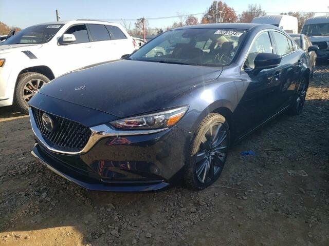 Синий Мазда 6, объемом двигателя 2.5 л и пробегом 27 тыс. км за 18600 $, фото 1 на Automoto.ua
