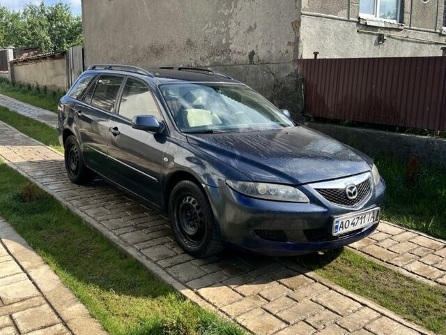 Синий Мазда 6, объемом двигателя 2 л и пробегом 300 тыс. км за 2200 $, фото 1 на Automoto.ua
