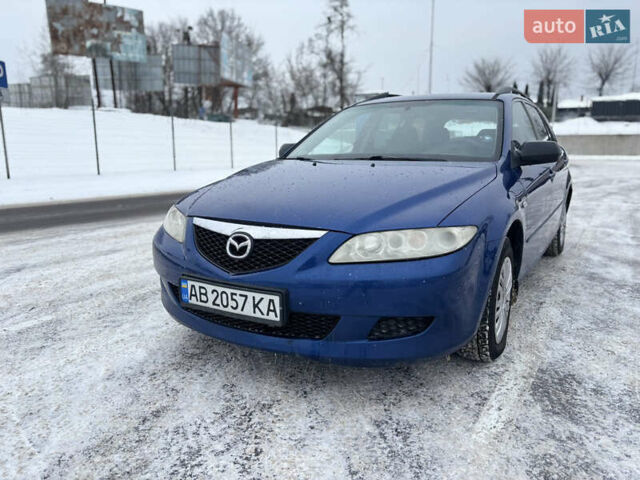 Синий Мазда 6, объемом двигателя 1.8 л и пробегом 370 тыс. км за 1800 $, фото 1 на Automoto.ua