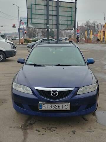 Синий Мазда 6, объемом двигателя 2 л и пробегом 300 тыс. км за 3900 $, фото 1 на Automoto.ua
