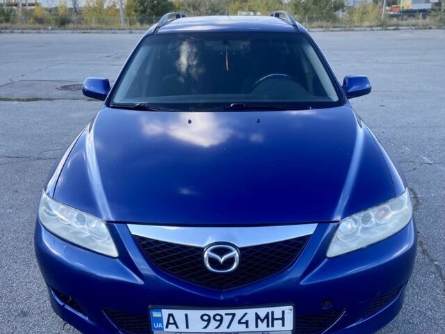 Синий Мазда 6, объемом двигателя 2 л и пробегом 350 тыс. км за 1999 $, фото 1 на Automoto.ua