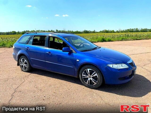 Синий Мазда 6, объемом двигателя 2 л и пробегом 381 тыс. км за 3000 $, фото 1 на Automoto.ua