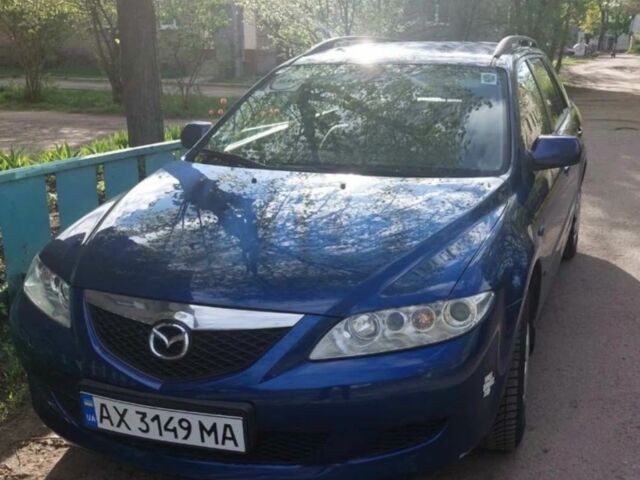 Синий Мазда 6, объемом двигателя 2 л и пробегом 210 тыс. км за 2610 $, фото 1 на Automoto.ua