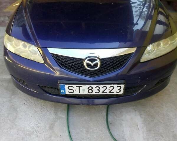 Синий Мазда 6, объемом двигателя 2 л и пробегом 250 тыс. км за 4200 $, фото 1 на Automoto.ua