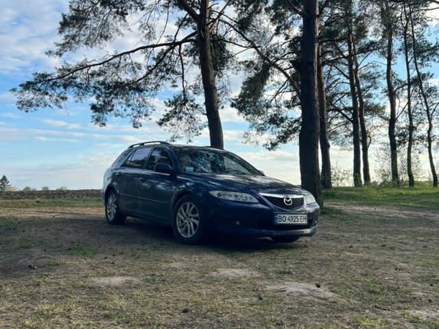 Синий Мазда 6, объемом двигателя 2 л и пробегом 410 тыс. км за 4100 $, фото 1 на Automoto.ua