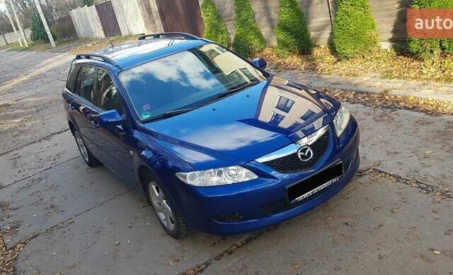 Синий Мазда 6, объемом двигателя 2 л и пробегом 285 тыс. км за 4300 $, фото 1 на Automoto.ua