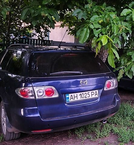 Синий Мазда 6, объемом двигателя 2 л и пробегом 230 тыс. км за 3500 $, фото 1 на Automoto.ua