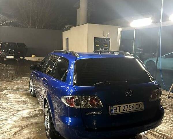Синий Мазда 6, объемом двигателя 2 л и пробегом 240 тыс. км за 4500 $, фото 1 на Automoto.ua