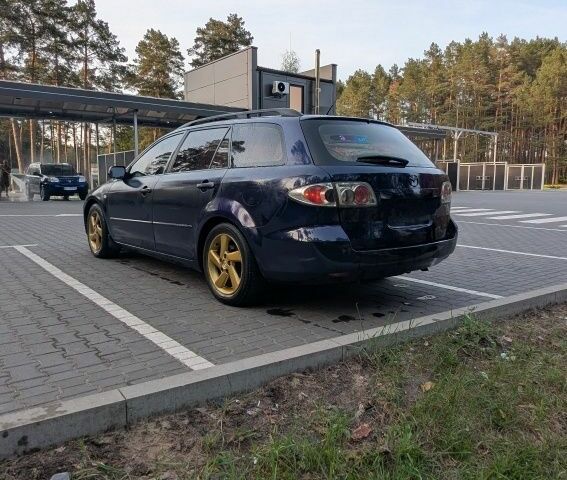 Синий Мазда 6, объемом двигателя 2 л и пробегом 380 тыс. км за 2700 $, фото 1 на Automoto.ua