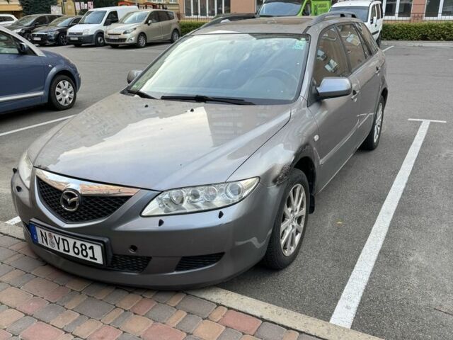 Синий Мазда 6, объемом двигателя 2 л и пробегом 233 тыс. км за 1350 $, фото 1 на Automoto.ua