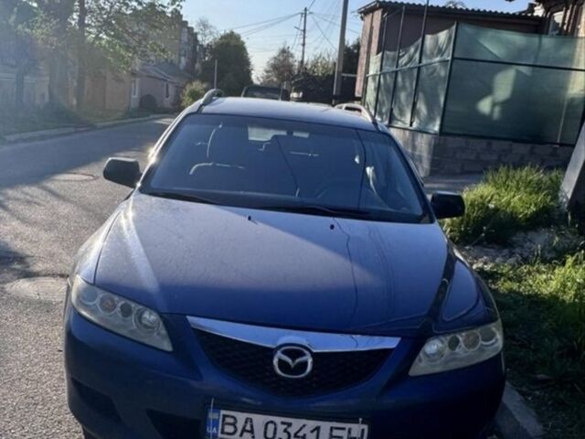 Синий Мазда 6, объемом двигателя 1.8 л и пробегом 362 тыс. км за 4100 $, фото 1 на Automoto.ua