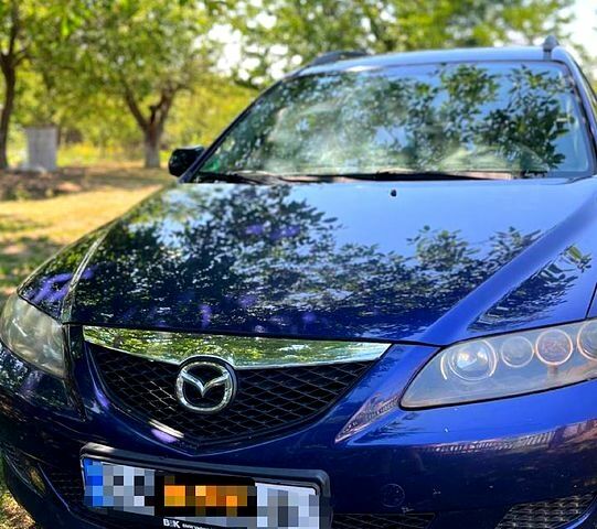 Синий Мазда 6, объемом двигателя 2 л и пробегом 220 тыс. км за 4300 $, фото 1 на Automoto.ua