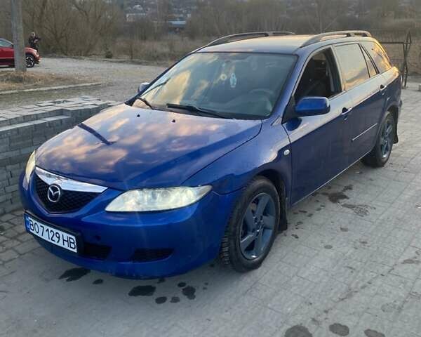 Синий Мазда 6, объемом двигателя 2 л и пробегом 323 тыс. км за 3900 $, фото 1 на Automoto.ua