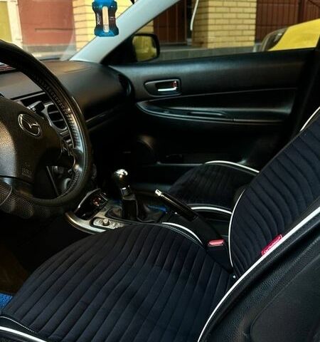 Синий Мазда 6, объемом двигателя 2 л и пробегом 301 тыс. км за 3700 $, фото 1 на Automoto.ua